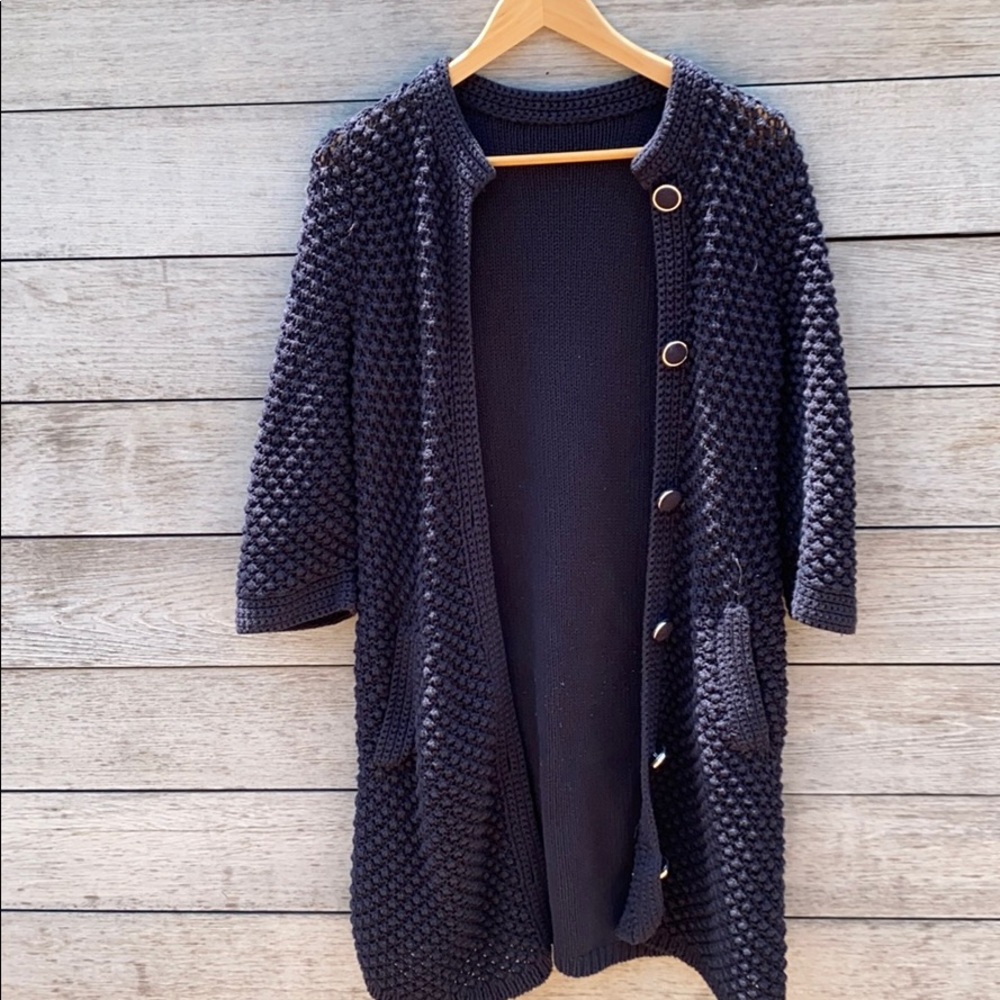 long woman’s knit navy sweater
